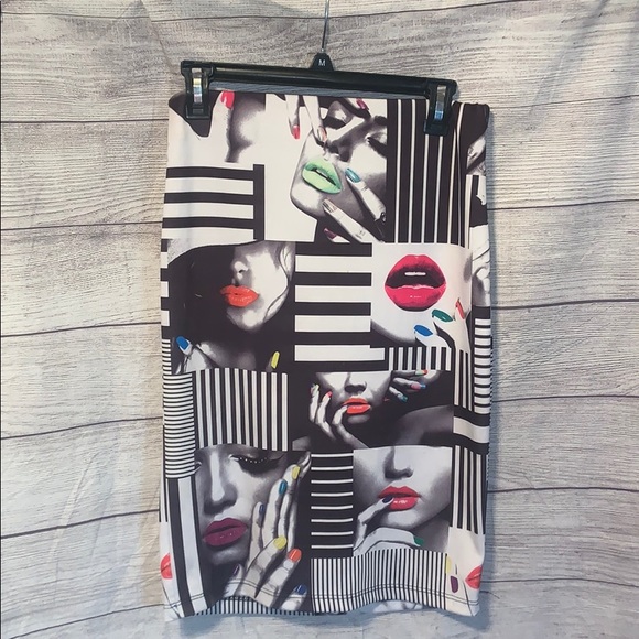 a'gaci Dresses & Skirts - AGACI graphic midi skirt size large